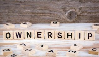 wooden blocks spelling out the word ownership
