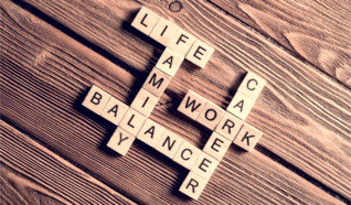 wooden blocks with letters on them spelling life, family, balance, career, work